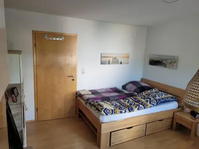 Ein Bett oder Betten in einem Zimmer der Unterkunft 3-Room Apartment in Rowhouse - Oktoberfest, Trade Shows, Business