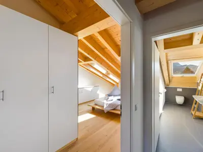 Ein Bett oder Betten in einem Zimmer der Unterkunft Gipfelkreuz mit Sauna