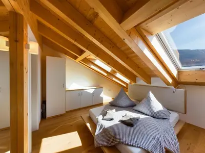 Ein Bett oder Betten in einem Zimmer der Unterkunft Gipfelkreuz mit Sauna