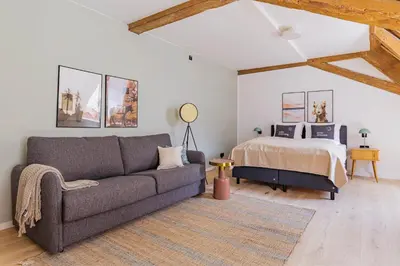Ein Bett oder Betten in einem Zimmer der Unterkunft Limehome Dachau Konrad-Adenauer-Str