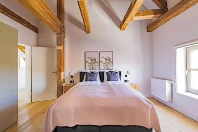 Ein Bett oder Betten in einem Zimmer der Unterkunft Limehome Dachau Konrad-Adenauer-Str