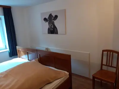 Ein Bett oder Betten in einem Zimmer der Unterkunft Ferienwohnung Melanie