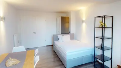 Ein Bett oder Betten in einem Zimmer der Unterkunft Spacious 4 Bedroom Apartment near City Center