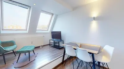 Ein Sitzbereich in der Unterkunft Spacious 4 Bedroom Apartment near City Center