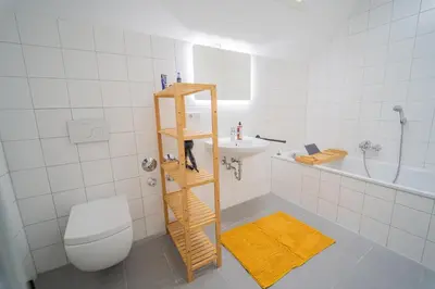 Ein Badezimmer in der Unterkunft LUXOMES - Tropical & Streetart Style - Old Town Apartments - Central Ingolstadt