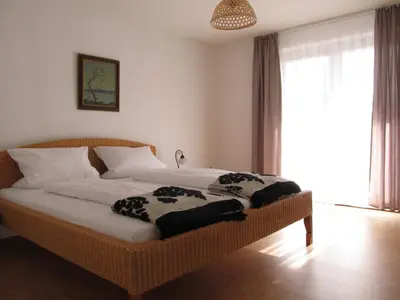 Ein Bett oder Betten in einem Zimmer der Unterkunft Ferienwohnung Bluhm