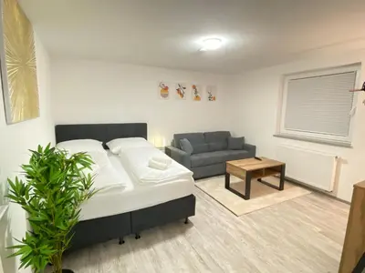 Ein Sitzbereich in der Unterkunft LUXOMES: Design Apartment - private Parking - 4 People