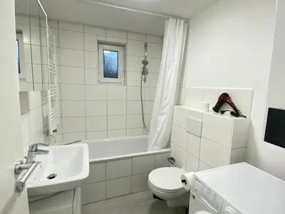 Ein Badezimmer in der Unterkunft LUXOMES: Design Apartment - private Parking - 4 People