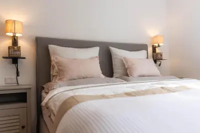 Ein Bett oder Betten in einem Zimmer der Unterkunft MY STAY- Erholung zwischen See und Bergen, neu erbaute Apartments im modernen Landhausstil mit Bergblick, familienfreundlich