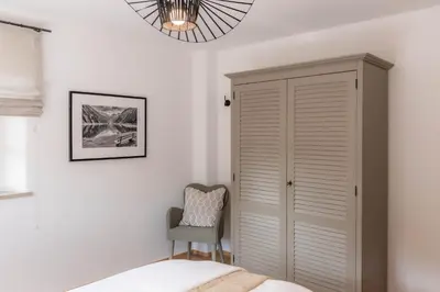 Ein Bett oder Betten in einem Zimmer der Unterkunft MY STAY- Erholung zwischen See und Bergen, neu erbaute Apartments im modernen Landhausstil mit Bergblick, familienfreundlich