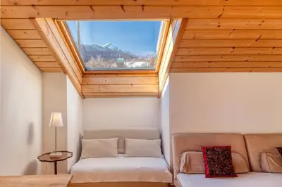 Ein Bett oder Betten in einem Zimmer der Unterkunft Ruhige Ferienwohnung Partenkirchen 2
