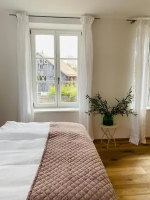 Ein Bett oder Betten in einem Zimmer der Unterkunft Alte Mühle Maising
