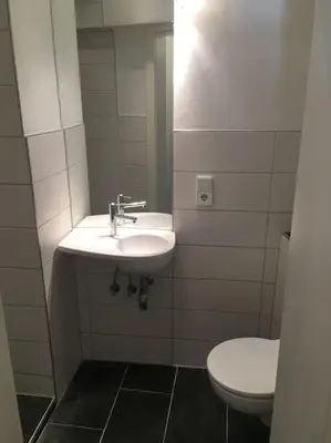 Ein Badezimmer in der Unterkunft Altbautraum am Gärtnerplatz 120 m2