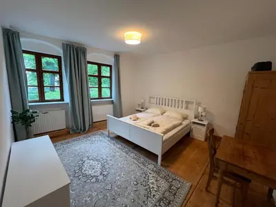 Ein Bett oder Betten in einem Zimmer der Unterkunft LIBORIA II Wohnen im Denkmal Augsburgs
