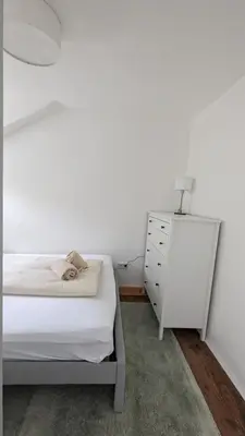 Ein Bett oder Betten in einem Zimmer der Unterkunft LIBORIA III Wohnen im Denkmal Augsburgs