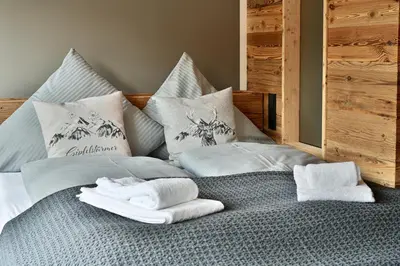Ein Bett oder Betten in einem Zimmer der Unterkunft Fauken-Kammerl