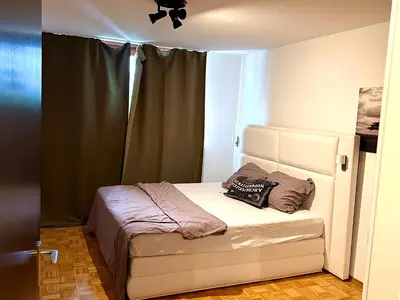 Ein Bett oder Betten in einem Zimmer der Unterkunft Luxury apartment Munich