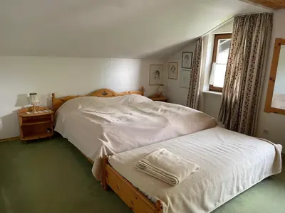 Ein Bett oder Betten in einem Zimmer der Unterkunft Oberaudorf-Kaiserblick