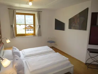 Ein Bett oder Betten in einem Zimmer der Unterkunft Apartment Flösserstrasse by Interhome