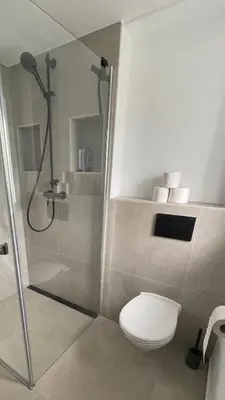 Ein Badezimmer in der Unterkunft Römer Apartment und Zimmer