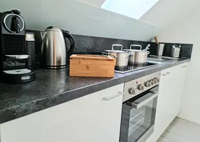 Küche/Küchenzeile in der Unterkunft Homestay-Stylish, Zentral- Loft Apartment-Parking