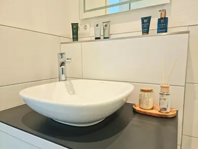 Ein Badezimmer in der Unterkunft Homestay-Stylish, Zentral- Loft Apartment-Parking