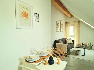 Ein Sitzbereich in der Unterkunft Homestay-Stylish, Zentral- Loft Apartment-Parking