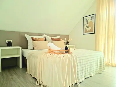 Ein Bett oder Betten in einem Zimmer der Unterkunft Homestay-Stylish, Zentral- Loft Apartment-Parking