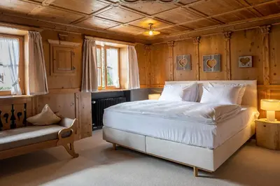 Ein Bett oder Betten in einem Zimmer der Unterkunft Fiakerhof