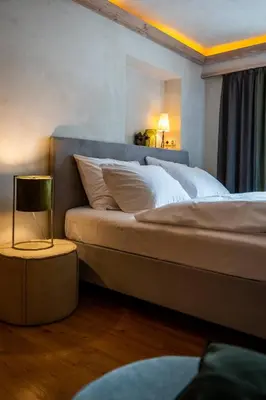 Ein Bett oder Betten in einem Zimmer der Unterkunft Fiakerhof