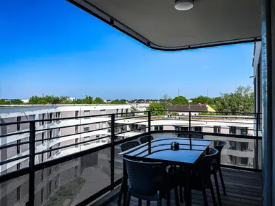Ein Balkon oder eine Terrasse in der Unterkunft UNiQE- 6 pers - design apartment - fair - SKY-TV - parking