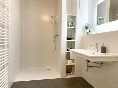 Ein Badezimmer in der Unterkunft UNiQE- 6 pers - design apartment - fair - SKY-TV - parking