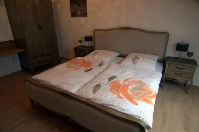 Ein Bett oder Betten in einem Zimmer der Unterkunft Bio Ferienhof Heiler