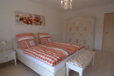 Ein Bett oder Betten in einem Zimmer der Unterkunft Bio Ferienhof Heiler