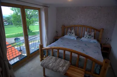 Ein Bett oder Betten in einem Zimmer der Unterkunft Bio Ferienhof Heiler