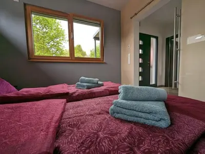 Ein Bett oder Betten in einem Zimmer der Unterkunft Wohnen im mobilen Haus