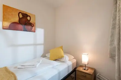 Ein Bett oder Betten in einem Zimmer der Unterkunft Ferienwohnung Spitzstein - Alpenmagie Suites