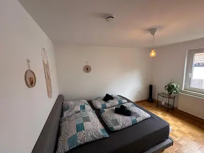 Ein Bett oder Betten in einem Zimmer der Unterkunft Ammersee Bungalow Verstecktes Juwel in Seenähe