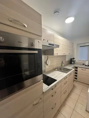 Küche/Küchenzeile in der Unterkunft Ammersee Bungalow Verstecktes Juwel in Seenähe