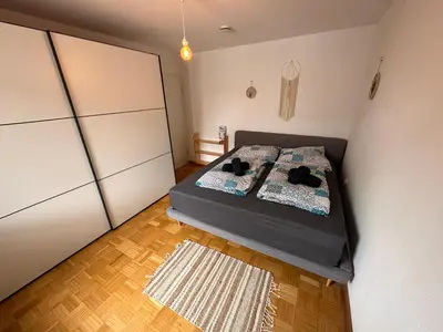 Ein Bett oder Betten in einem Zimmer der Unterkunft Ammersee Bungalow Verstecktes Juwel in Seenähe