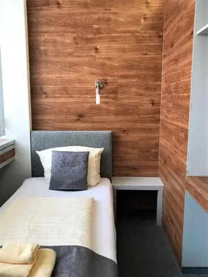 Ein Bett oder Betten in einem Zimmer der Unterkunft CREO Munich City