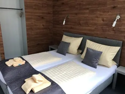 Ein Bett oder Betten in einem Zimmer der Unterkunft CREO Munich City