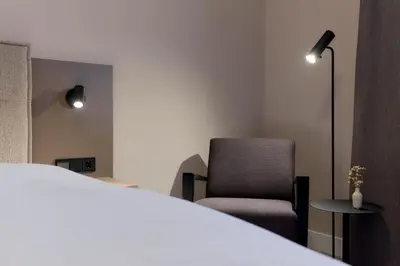 Ein Bett oder Betten in einem Zimmer der Unterkunft Hotel Müllerbräu