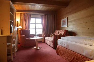Ein Bett oder Betten in einem Zimmer der Unterkunft Hotel Gasthof Alte Post Holzkirchen