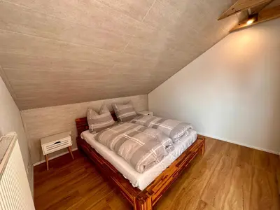 Ein Bett oder Betten in einem Zimmer der Unterkunft Gennachblick