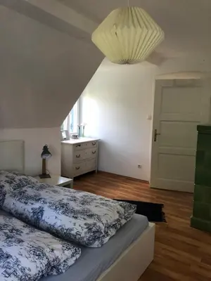 Ein Bett oder Betten in einem Zimmer der Unterkunft Ferienhaus Chiemsee