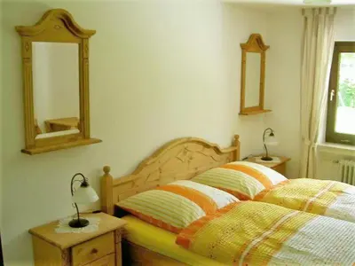 Ein Bett oder Betten in einem Zimmer der Unterkunft Gästehaus Ehrlich