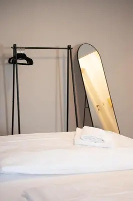 Ein Bett oder Betten in einem Zimmer der Unterkunft meywohnen Prien am Chiemsee