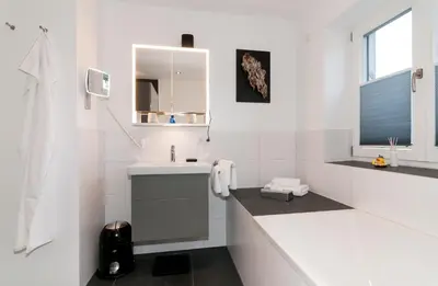 Ein Badezimmer in der Unterkunft Ferienwohnung RottachSuite