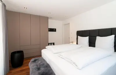 Ein Bett oder Betten in einem Zimmer der Unterkunft Ferienwohnung RottachSuite